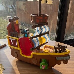 Fisher-Price Brown Pirate Ship Playset with Blue & White Sail and Yellow Trim